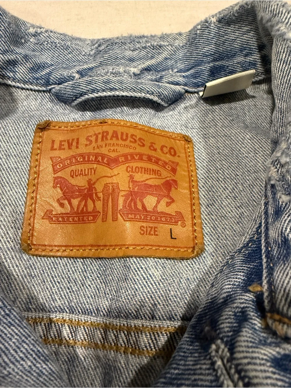 Levi's Light Wash Distressed Denim Trucker Jacket - Men's size Large